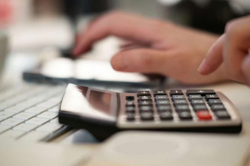 A visual representation of AI finance tools, with charts, graphs, and data flowing into a digital interface, symbolizing smart money management.