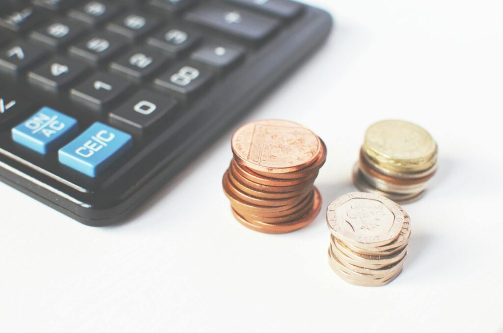 Visual comparison of growth from SIP and Fixed Deposit investments, with a calculator icon representing financial planning