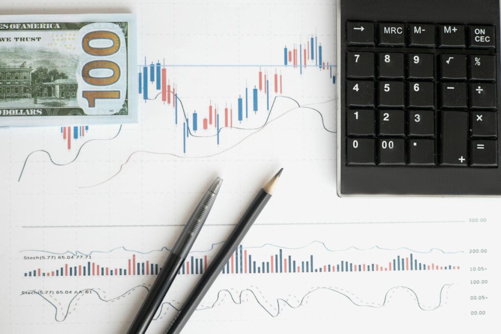 Infographic showing the formula for marketing ROI calculation with charts and data on a screen