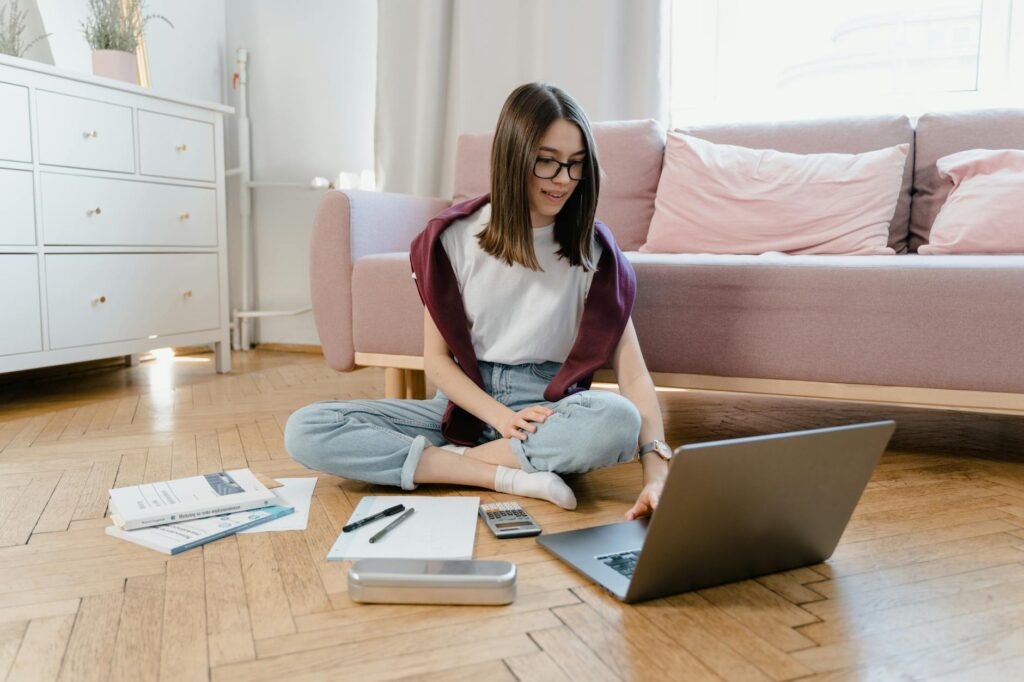 Student using various online academic calculators on a laptop for different subjects