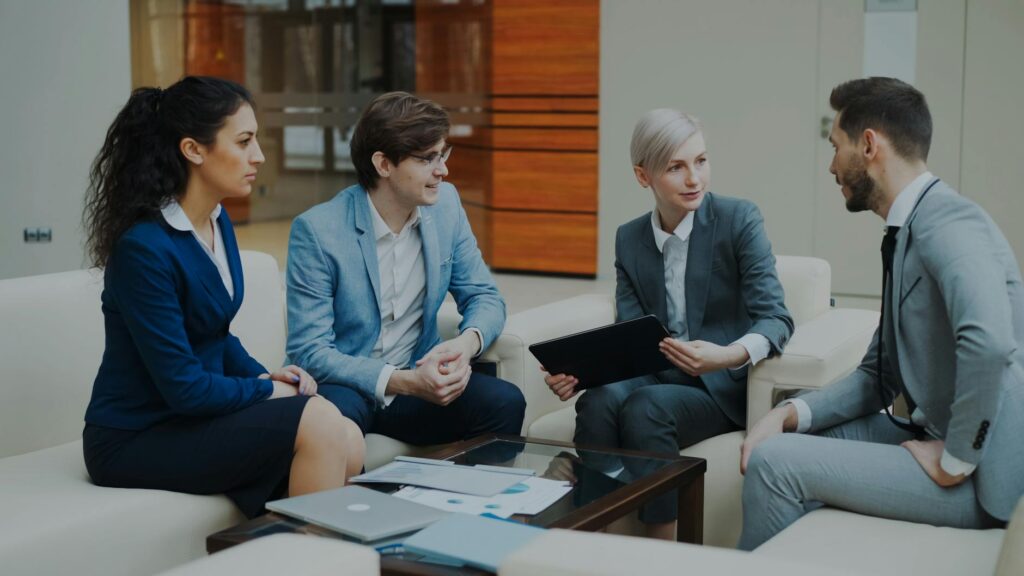 HR professionals using a payroll calculator for efficient employee payroll management across different regions